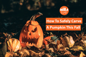 how to safely carve a pumpkin - jackolantern in fall leaves